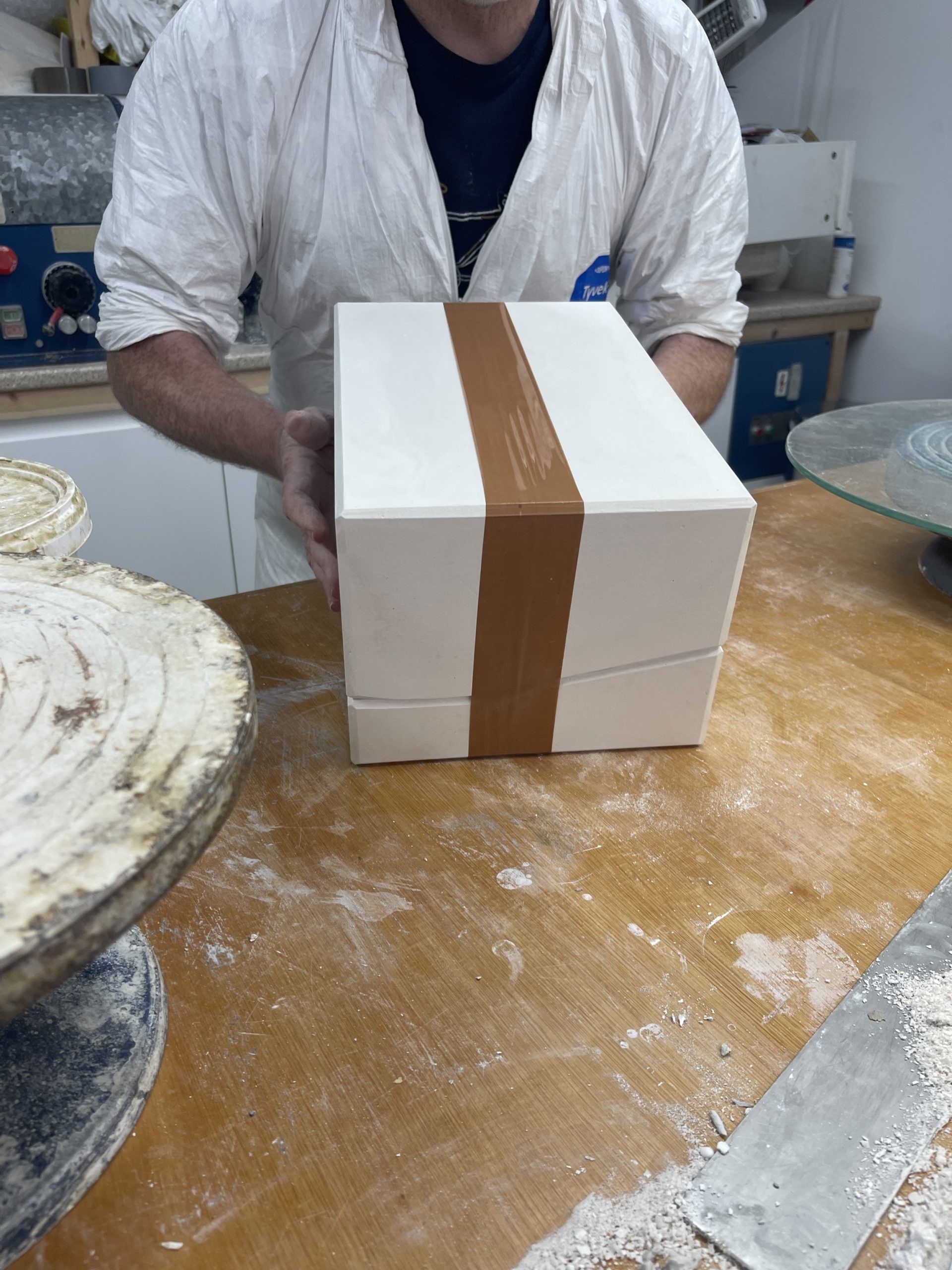  Ensuring the mould doesn't warp whilst it drys using packaging tape. 