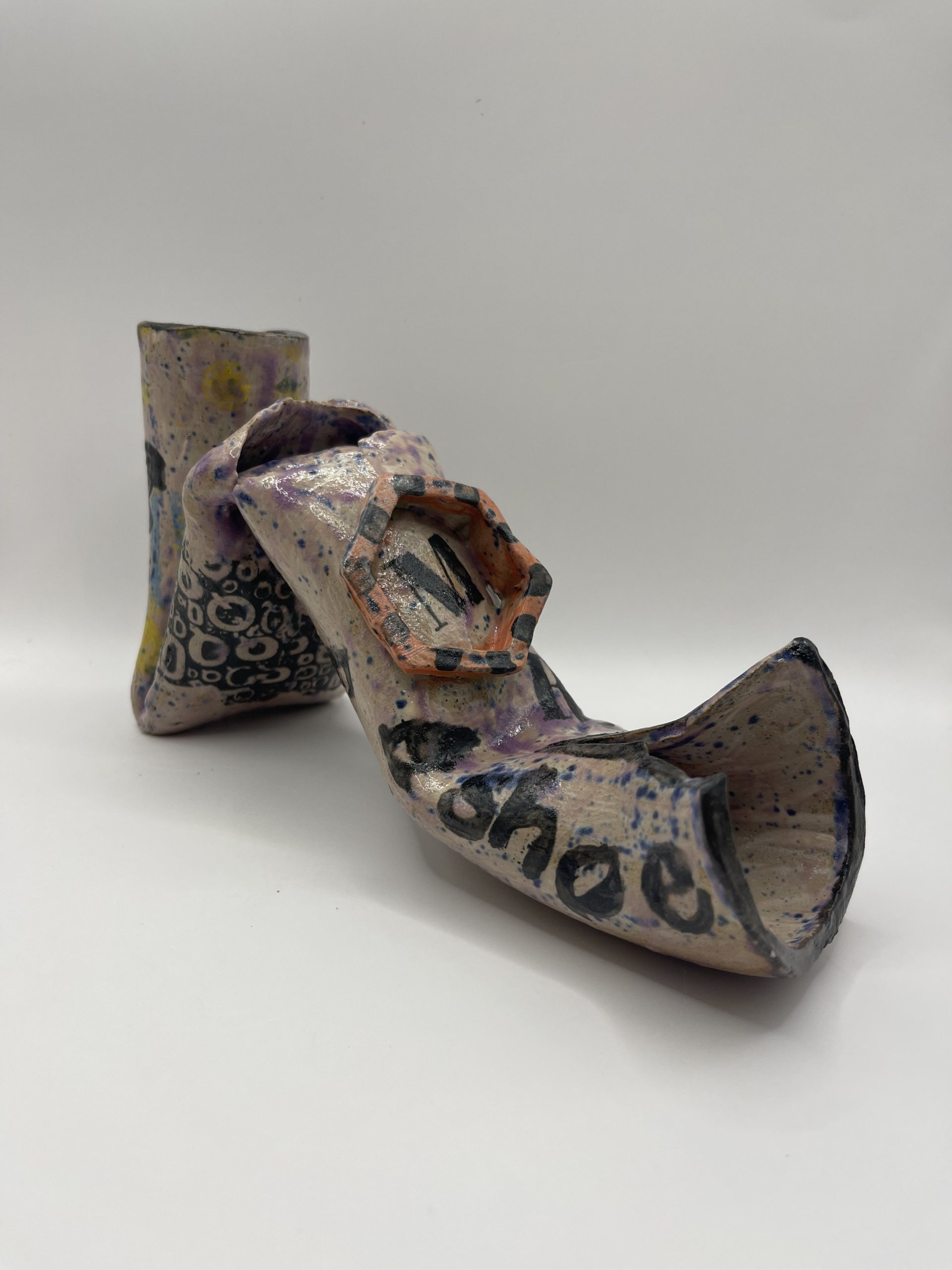  Kinky boots. White stoneware and underglazes. 